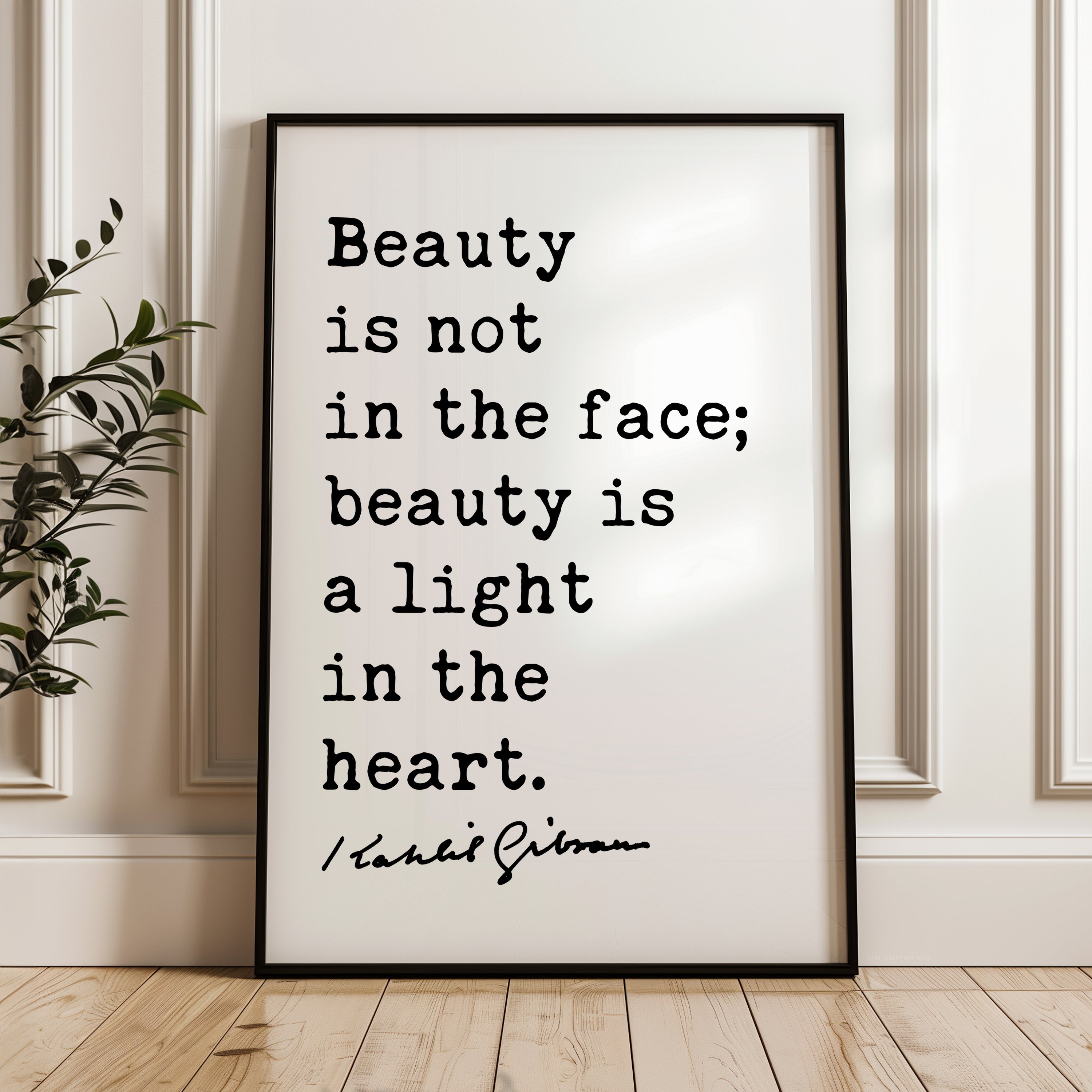 A framed quote by Renee Brown stating "Beauty is not in the face; beauty is a light in the heart."