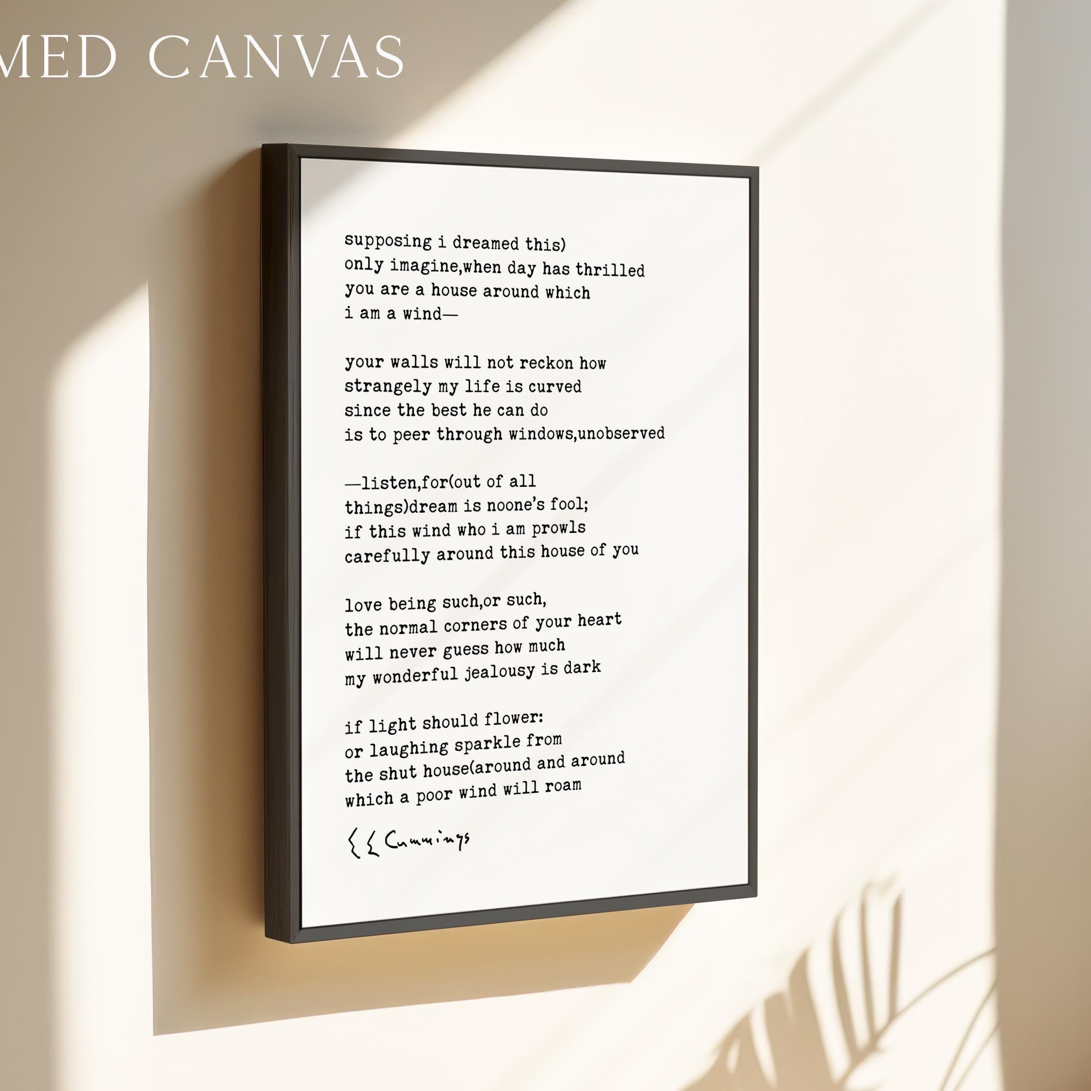 a framed canvas with a poem written on it, hanging on a wall.