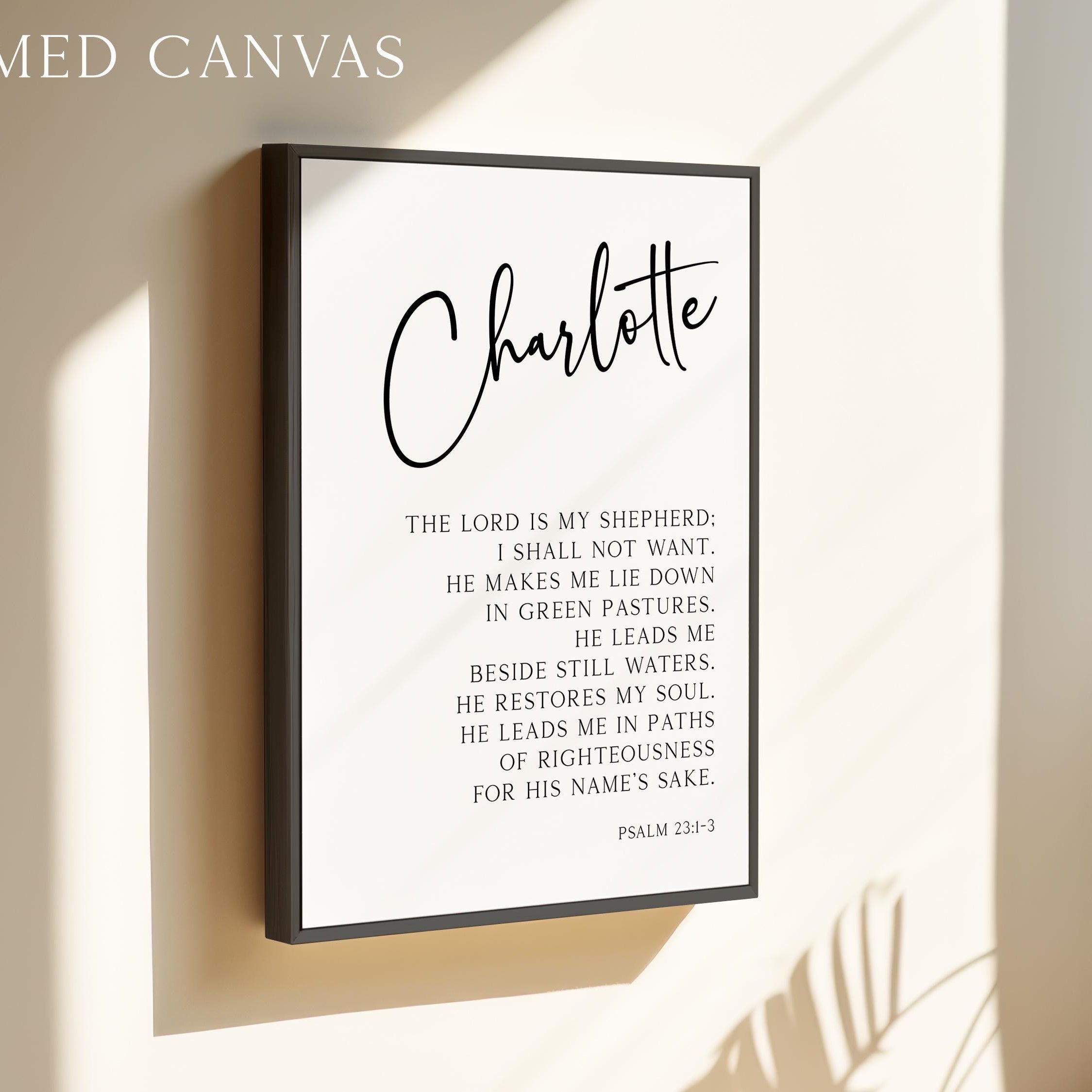 a framed canvas with a black and white text quote from the Bible, specifically Psalm 23:3.