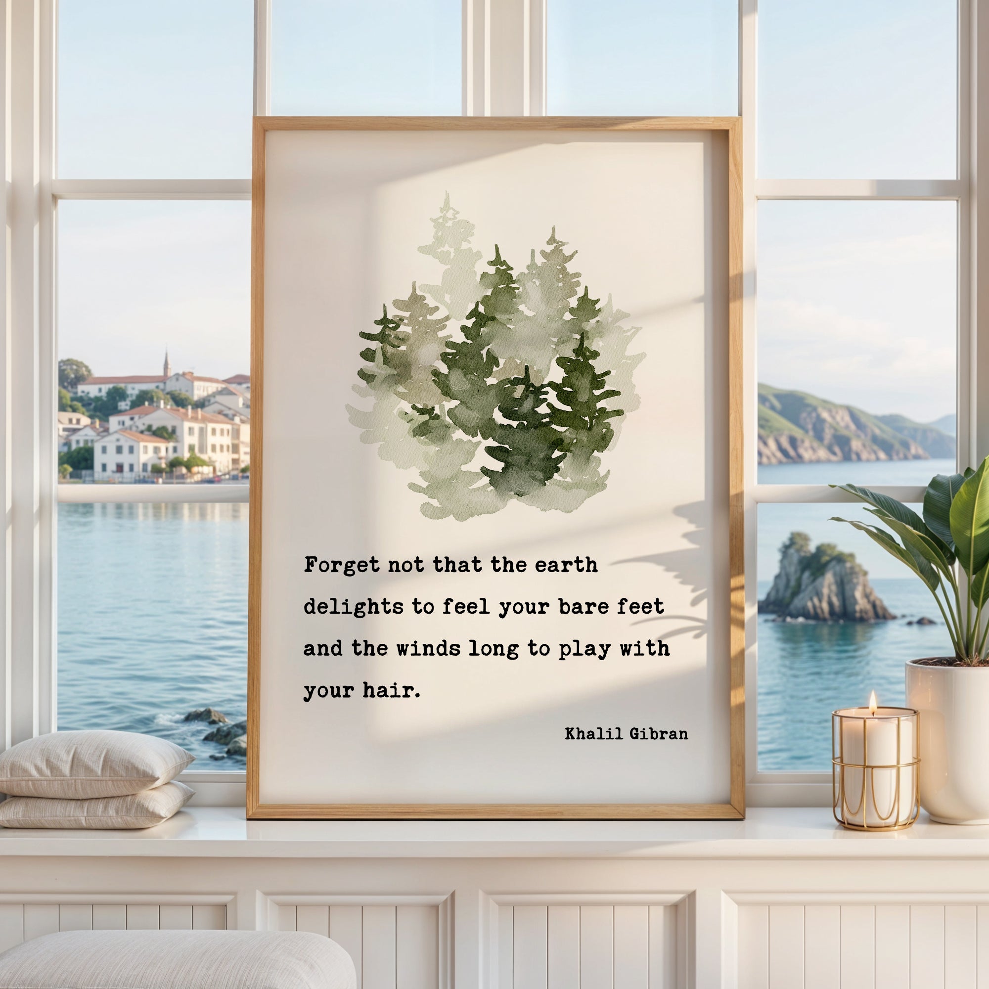 a framed quote by Khali Gibran about appreciating the beauty of nature and the simple joys in life, such as the wind and the sea.