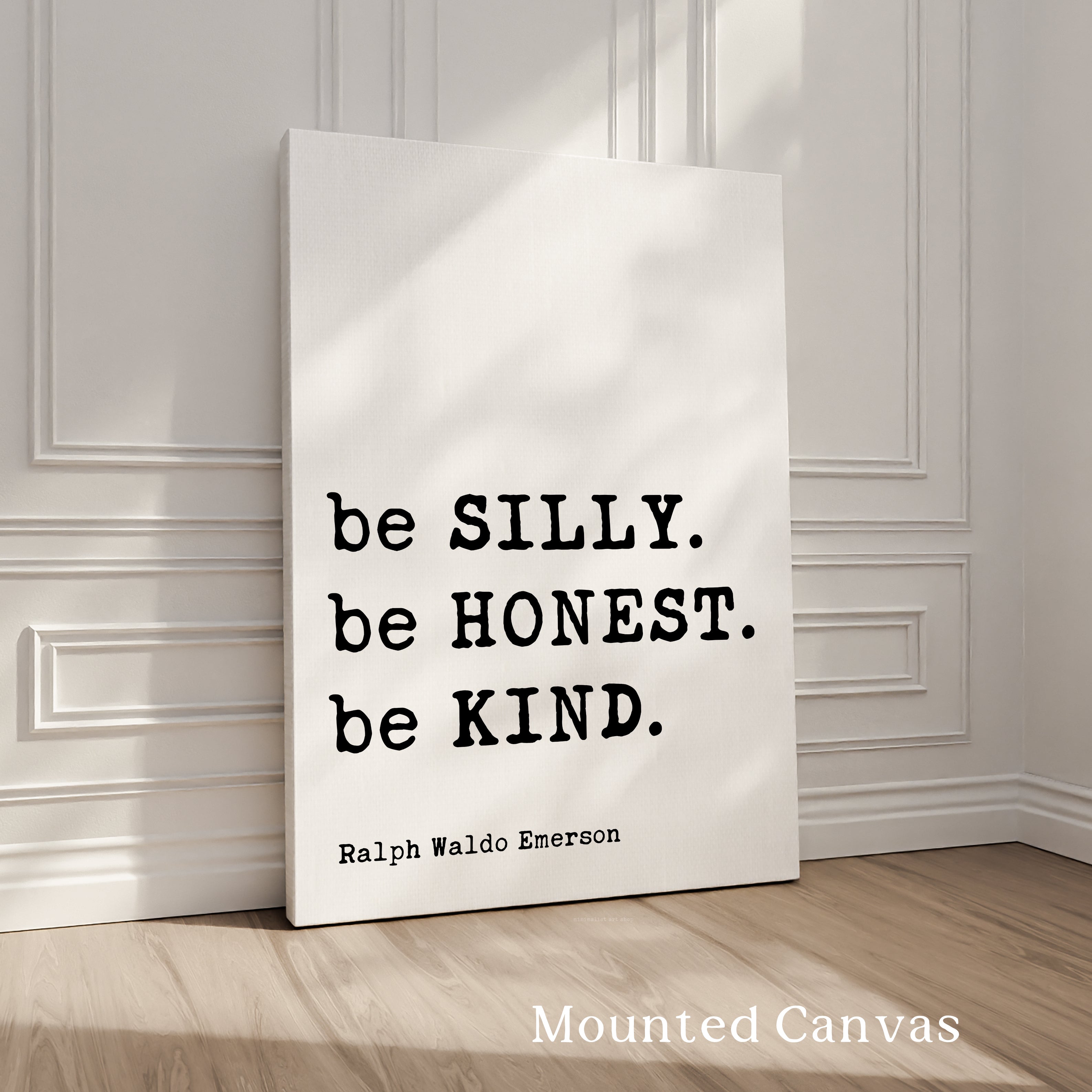 A white canvas with a quote by Ralph Waldo Emerson, "be SILLY. be Honest. be KIND.", displayed on it.