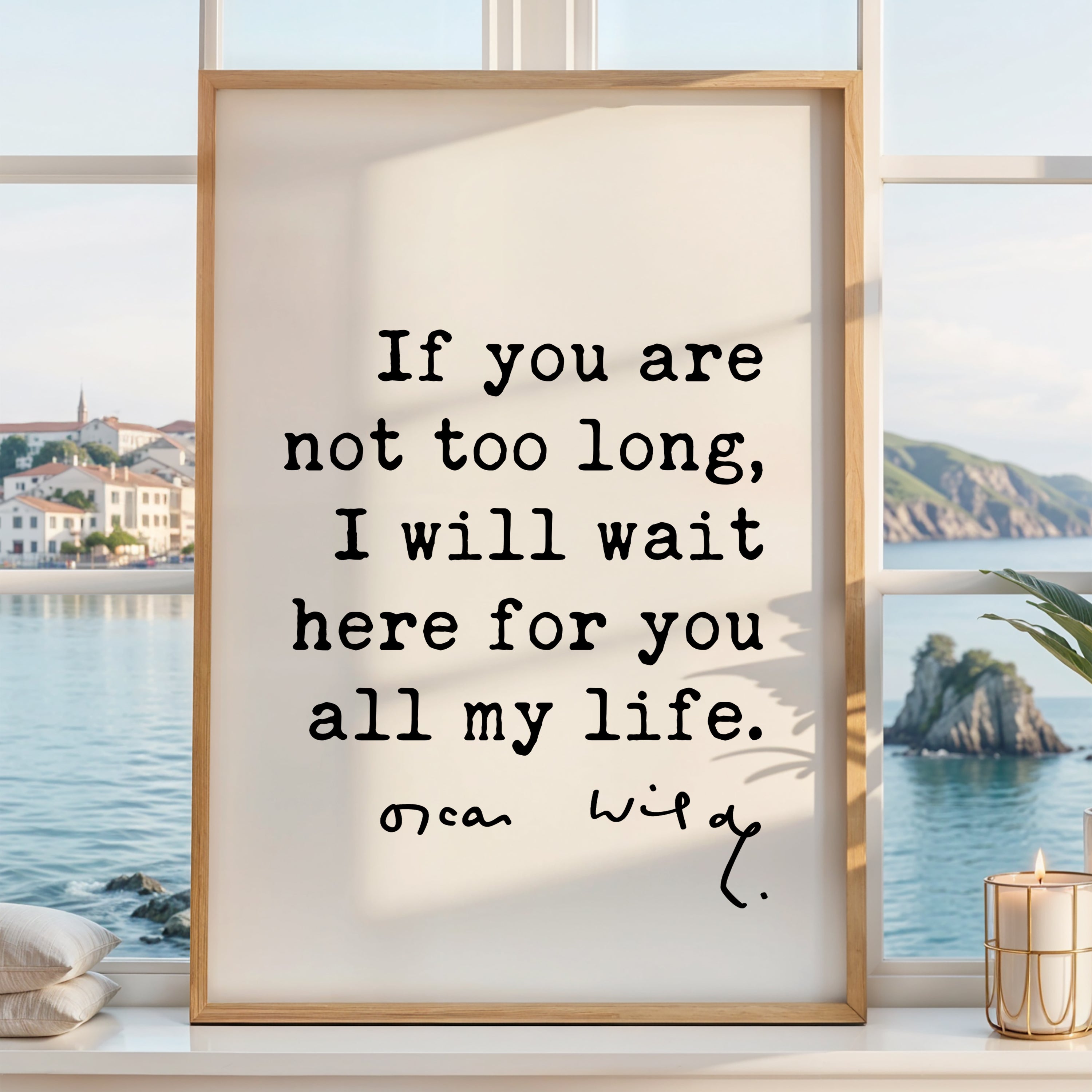 a framed quote by Oscar Wilde that reads, "If you are not too long, I will wait here for you all my life." The quote is set against a scenic view of a body of water and a coastal town, creating a serene and contemplative atmosphere.