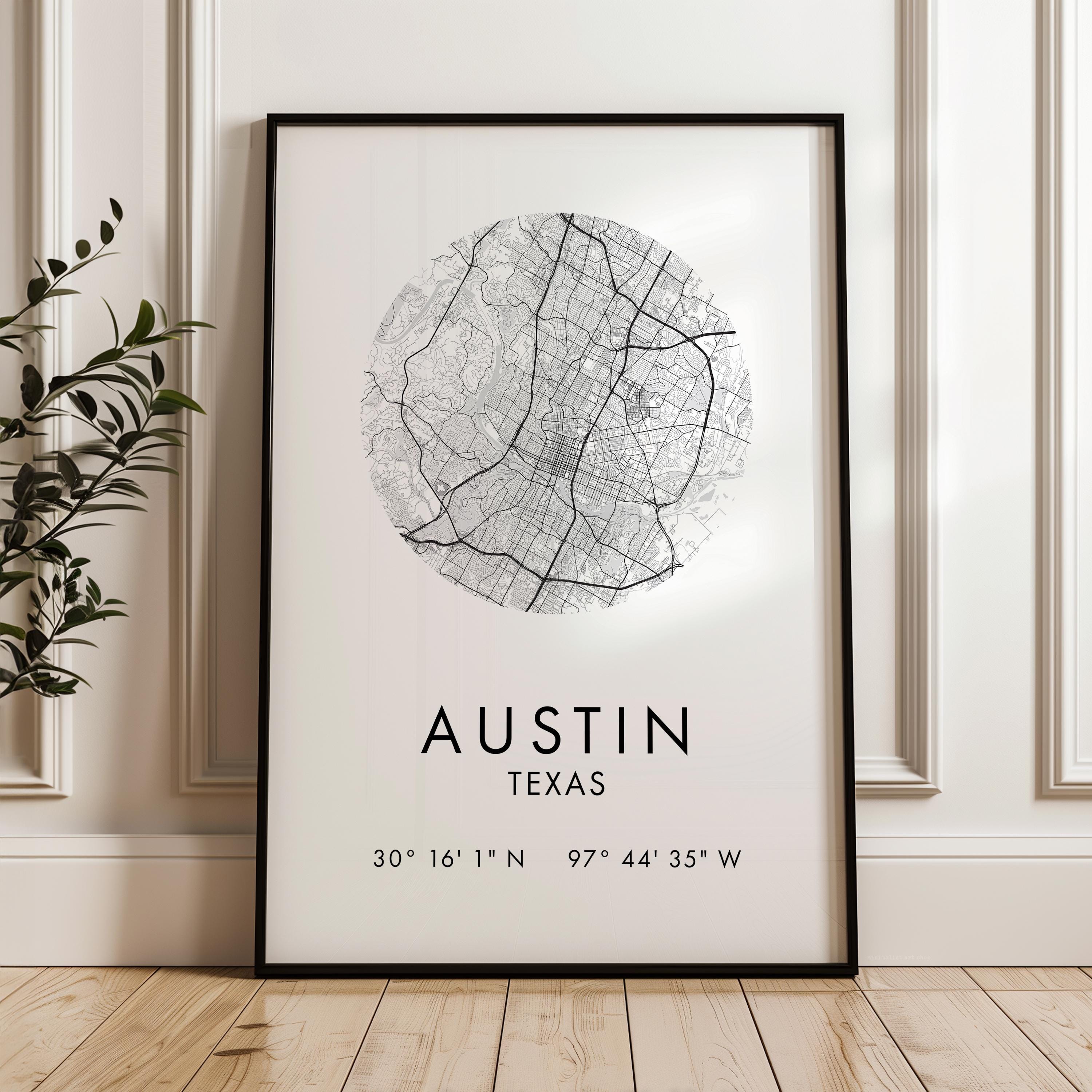A framed print of a map of Austin, Texas, with the city's location and coordinates displayed.