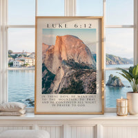 a framed photograph of a mountain landscape with a text overlay that reads "In these days, he went out to the mountain to pray, and he continued all night in prayer to God."