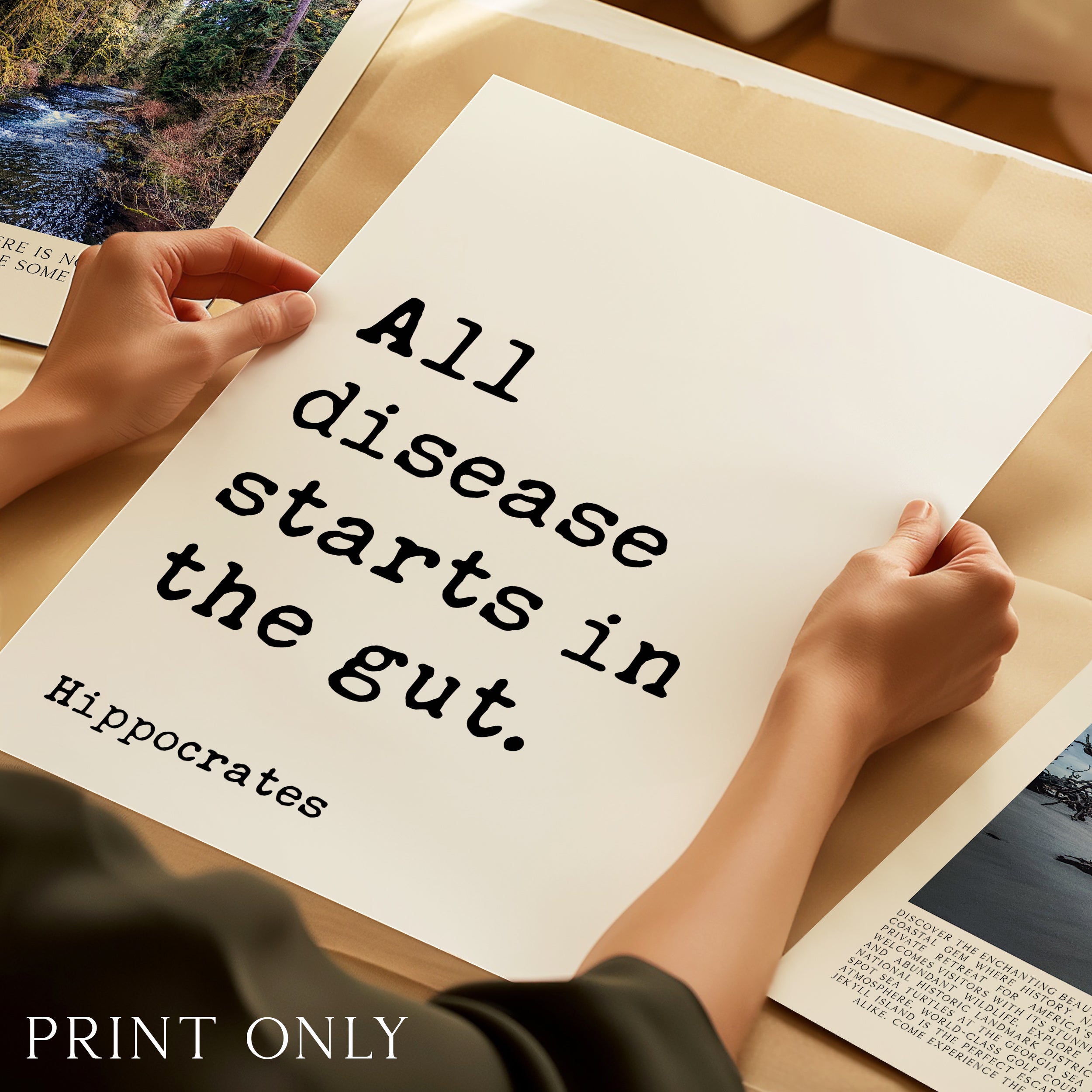 a person's hands holding a piece of paper with a quote from Hippocrates printed on it.