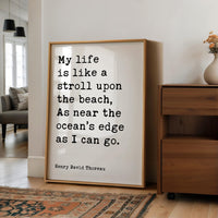 My life is like a stroll upon the beach, As near the ocean's edge as I can go. • Henry David Thoreau Quote • Typography Art Print