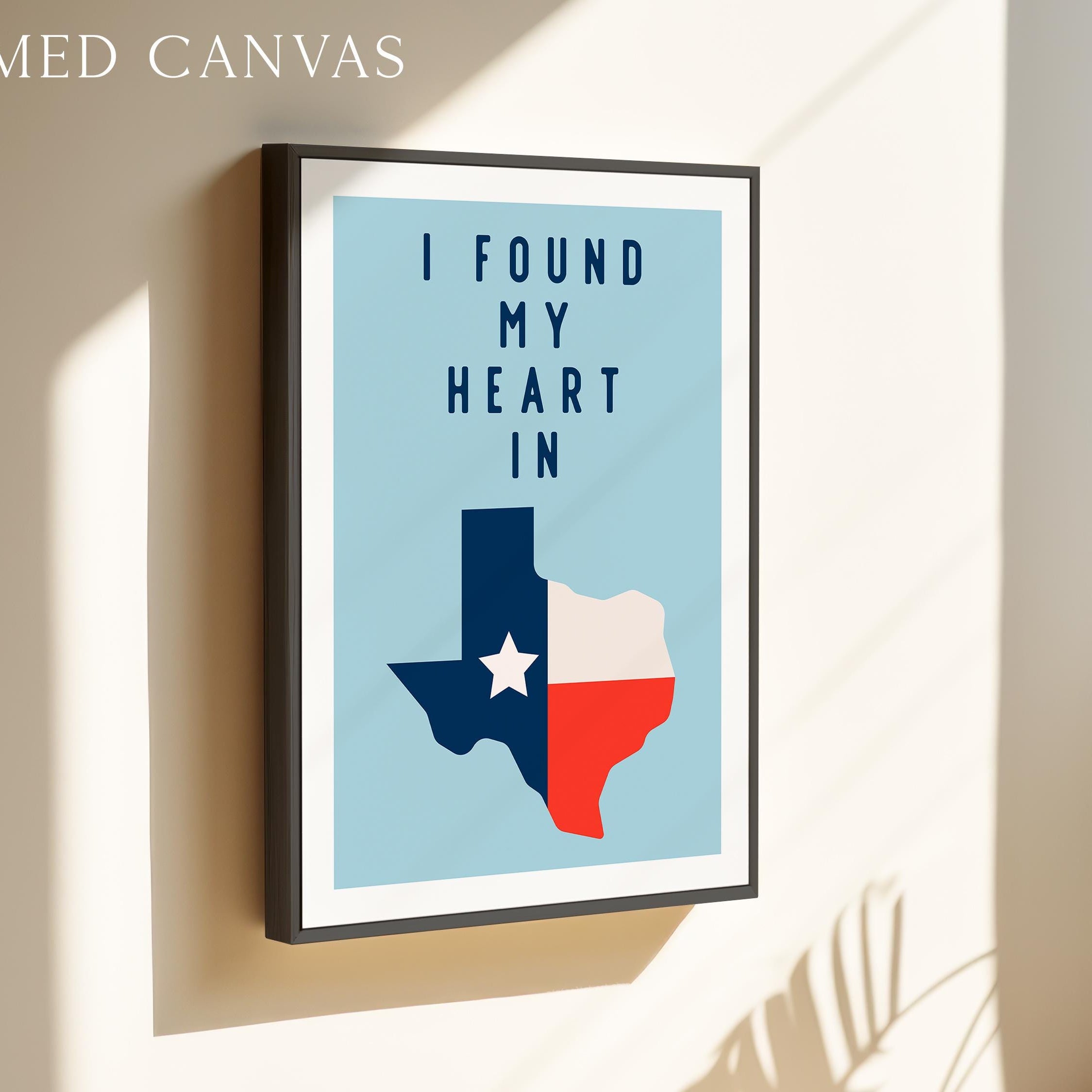 a framed poster with a Texas state map and the text "I FOUND MY HEART IN" displayed on it.