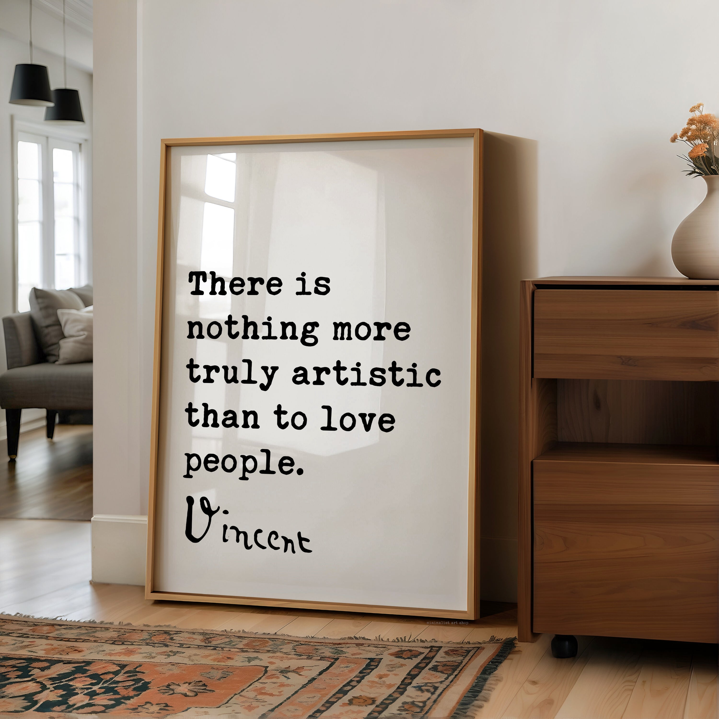 a framed quote by Vincent Van Gogh that reads, "There is nothing more truly artistic than to love people."