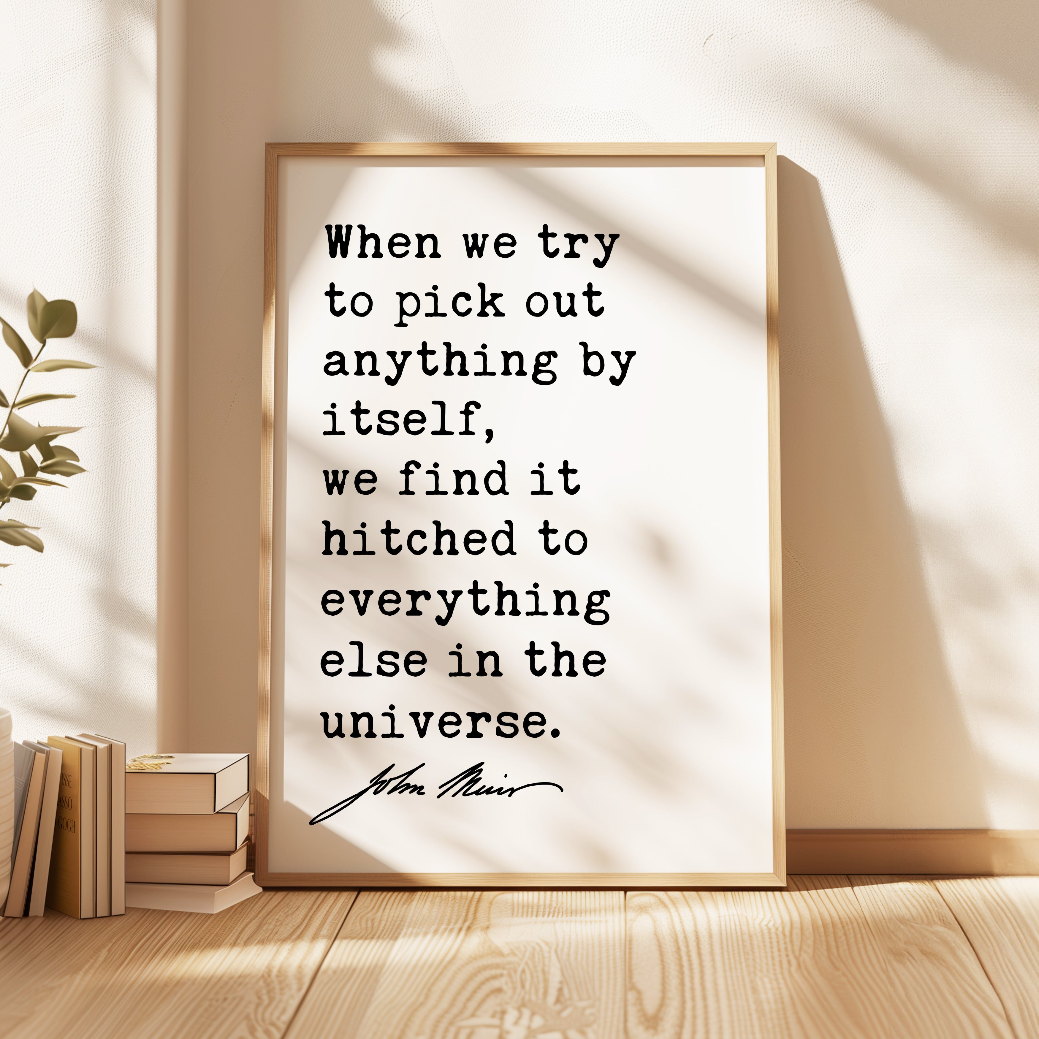 a framed quote by John Muir, which reads: "When we try to pick out anything by itself, we find it hitched to everything else in the universe."