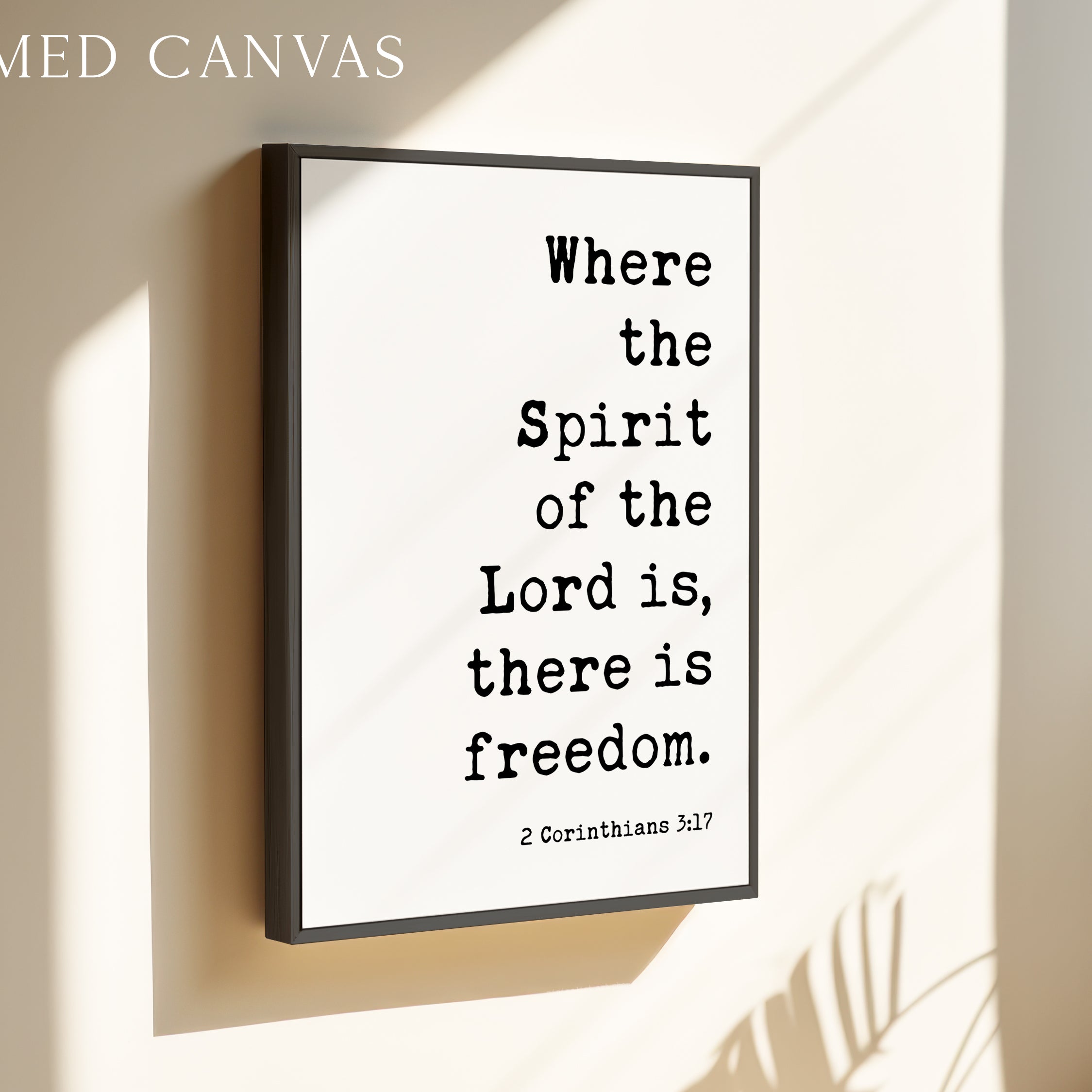 a framed canvas with a quote from 2 Corinthians 3:7, which reads "Where the Spirit of the Lord is, there is freedom."