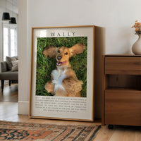 A framed photograph of a dog lying on grass, with a caption that reads "Wally was more than a beloved pet. He was family, a loving companion, and a source of unconditional love and the joy he brought to our lives. Through him, we learned to live without the dog prints he left behind. Will remain forever in our hearts."