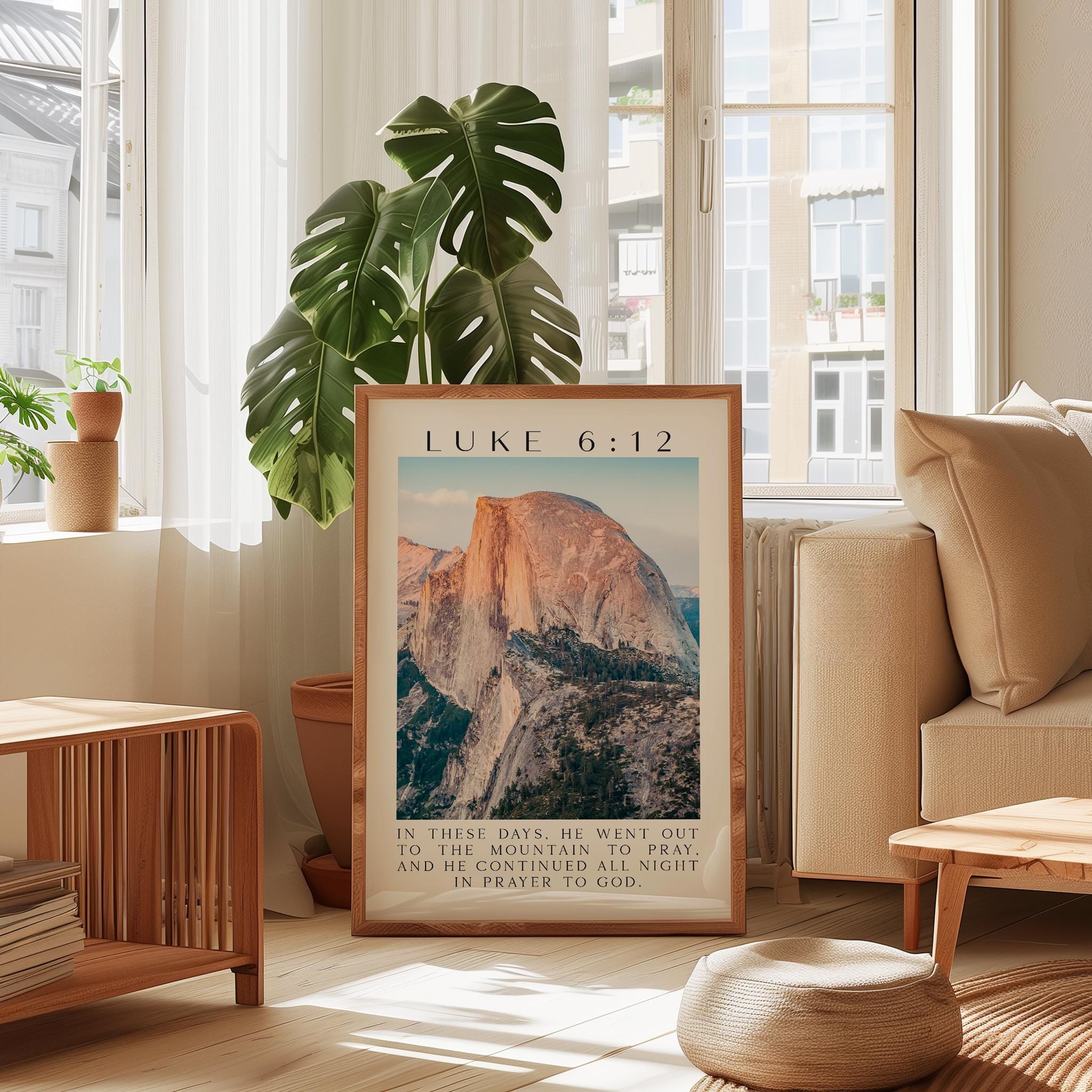 a framed poster of a mountain landscape, with a text overlay that reads " Luke 6:12" and "In these days he went out in the mountains to pray and he continued all night in prayer to God".