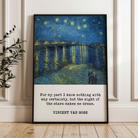 The image is a framed painting depicting a night sky with stars, and it is placed on a wooden floor against a white wall.
