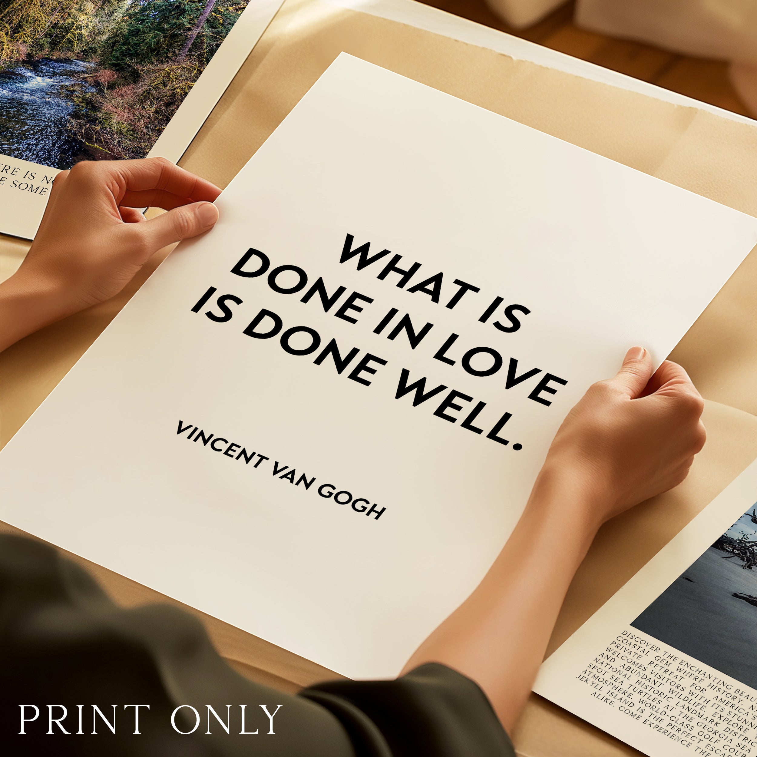 A person's hands are holding a large white paper with the quote "What is done in love is well" by Vincent Van Gogh.
