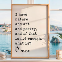 a framed quote by Vincent Van Gogh, which reads "I have nature and art and poetry, and if that is not enough, what is?" The quote is displayed in a white frame, and the background shows a scenic view of a body of water and a town.