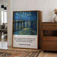 a large framed painting of a starry night landscape, with a quote by Vincent Van Gogh below it.