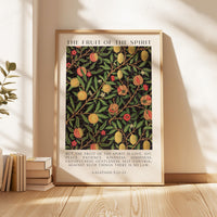May include: Framed art print featuring a botanical design with a dark background and colorful fruits and leaves. The text at the top reads "THE FRUIT OF THE SPIRIT". The bottom text includes a Bible verse from Galatians 5:22-23.