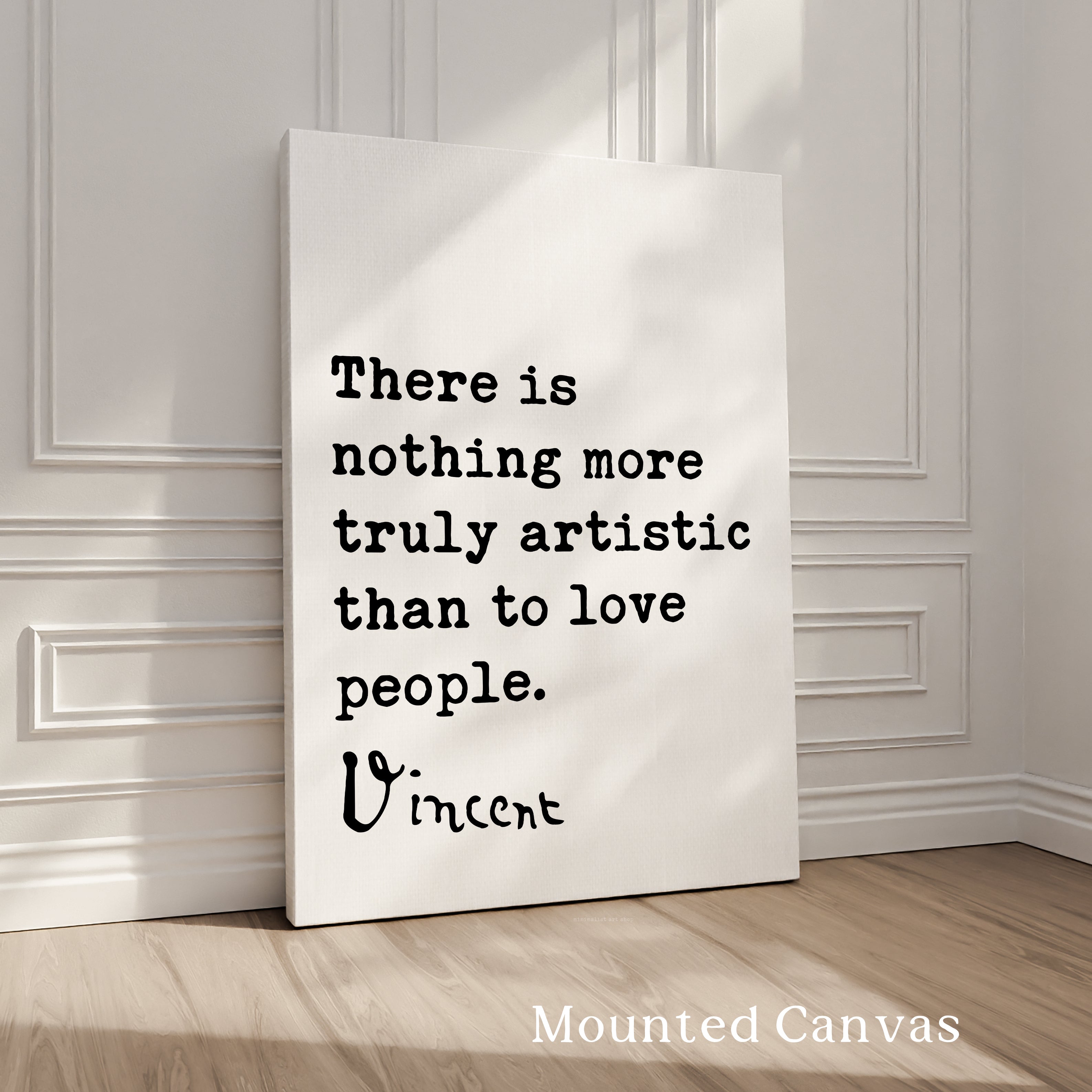 a quote by Vincent Van Gogh on a canvas, placed on a wooden floor against a white wall.