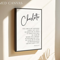 a framed canvas with a black and white text quote from the Bible, specifically Psalm 23:3.