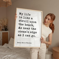 My life is like a stroll upon the beach, As near the ocean's edge as I can go.,  Henry David Thoreau Quote,  Typography Art Print