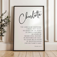 a framed poster with a biblical quote from the Bible, specifically Psalm 23:1-3, which reads: "The LORD is my shepherd; I shall not want. He makes me lie down in green pastures. He leads me in green pastures. He leads me in green pastures. He leads me in green pastures. He leads me in paths of righteousness for his name's sake."