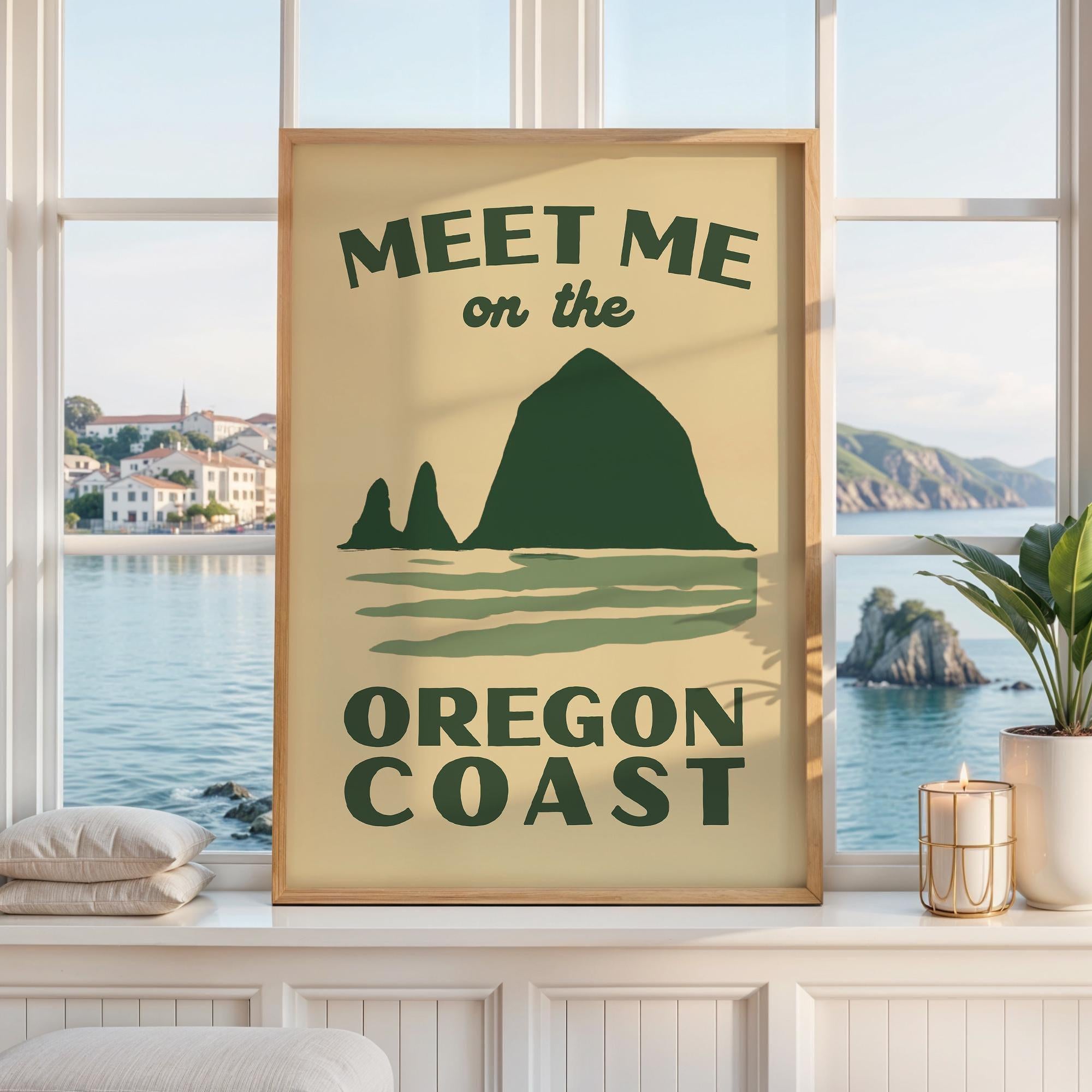 May include: A rectangular wall art print with a light beige background featuring dark green text that reads MEET ME on the OREGON COAST. The design includes a dark green graphic of a large coastal rock formation above stylized water waves.