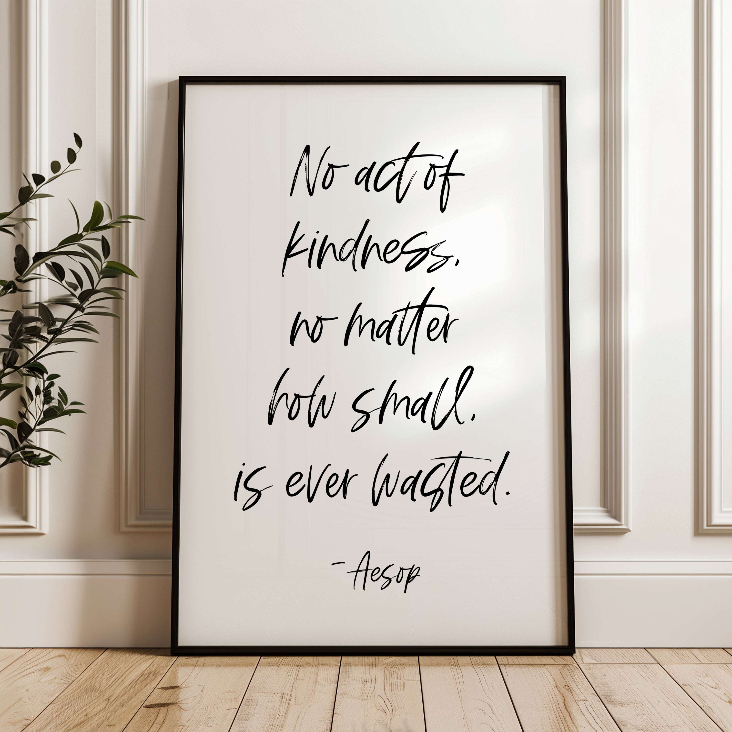 a framed quote by Aesop that reads "No act of kindness, no matter how small, is ever wasted."