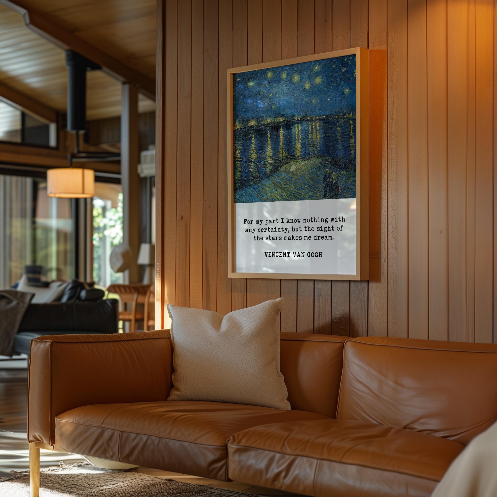 a cozy living room with a brown leather couch, a framed painting of a starry night sky, and a quote by Vincent Van Gogh hanging on the wall.