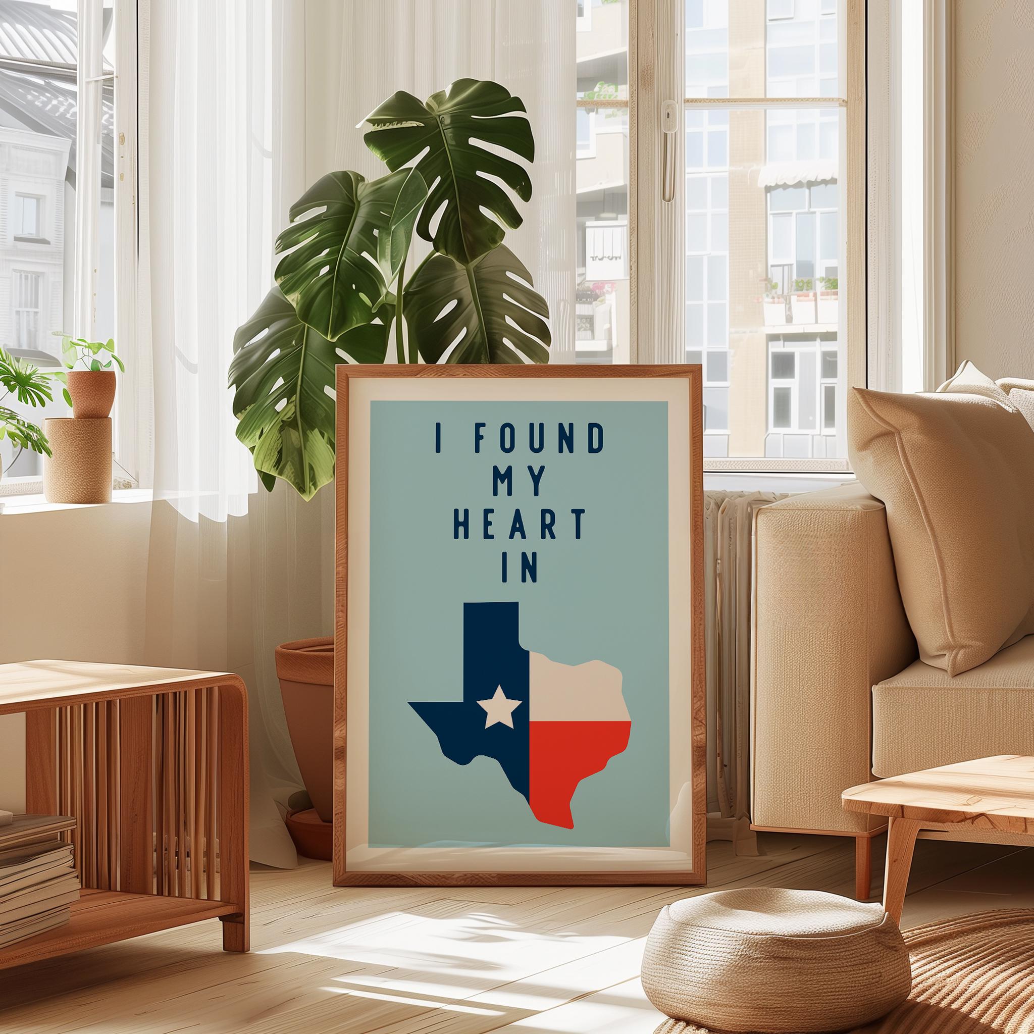 a framed poster with the text "I FOUND MY HEART IN" and a graphic of the state of Texas.