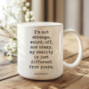 I’m not strange, weird, off, nor crazy, my reality is just different from yours. • Lewis Carroll Quote • Coffee Mug
